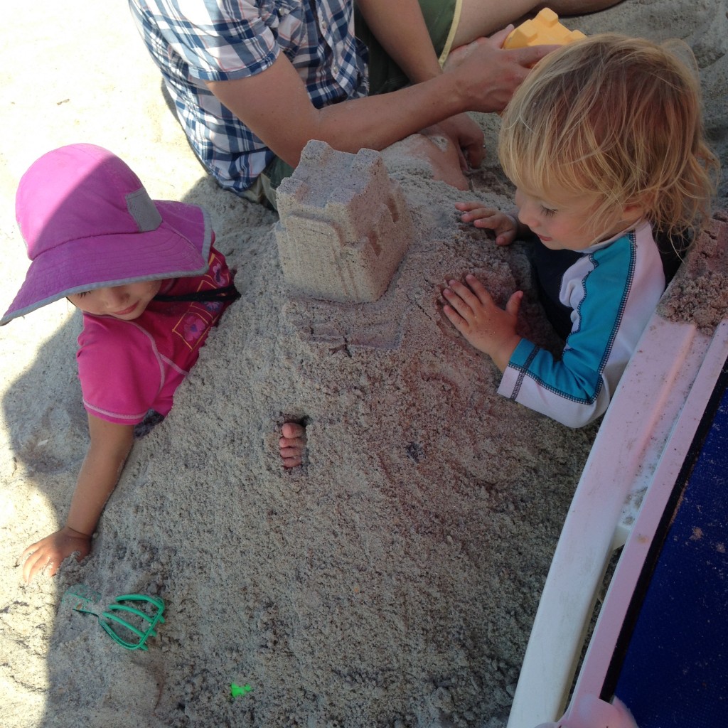 playing + building sandcastles